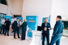 Speakers and delegates networking at the UIPath display 