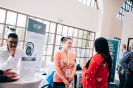 Delegates networking at the Larcai display
