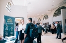 Delegates networking at the Larcai display