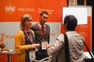 Delegates networking at the WeDoTech sponsor stand