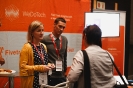 Delegates networking at the WeDoTech sponsor stand