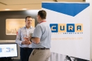 Delegates networking at CURA Software display area