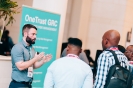 Delegates networking at the OneTrust sponsor stand