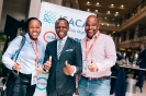 Tichaona Zororo and delegates at the ISACA display