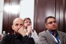 Speakers - Charl van der Walt and Pukhraj Singh listening to a session