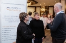 Delegates networking at the Mobius Consulting stand