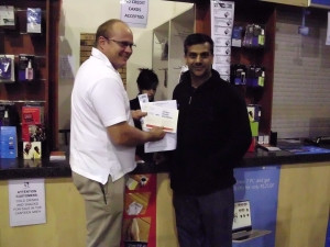 Pictured here with Asgar Mahomed, MD of Esquire Technologies, is Robyn Deary, the first person in South Africa to get his hands on a copy of Windows 8 Pro.