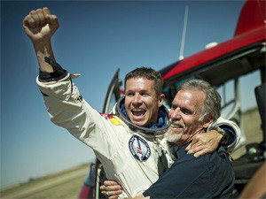 Austrian daredevil Felix Baumgartner celebrates his successful jump from the stratosphere.
