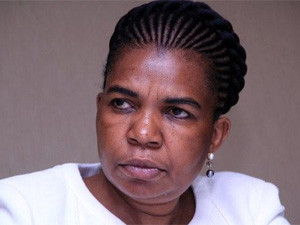 Communications minister Dina Pule has no intention of resigning despite a series of damning articles in the Sunday Times, which she says are part of a blackmail plot.