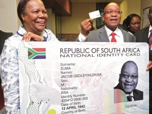 President Jacob Zuma receives his smart card at the Department of Home Affairs office in Pretoria two weeks after the official launch.