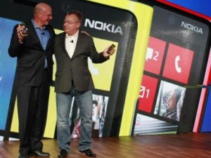 Standing together: Steve Ballmer and Stephen Elop. . (Photograph by Reuters)