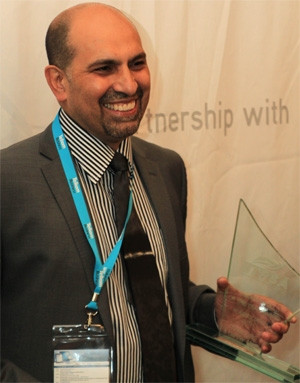 Visionary CIO 2013, Sal Laher, with his trophy. Photograph by Dylan Mohlala.