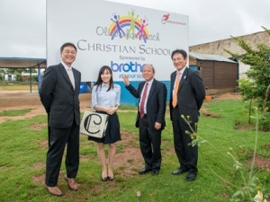 Celebrating Brother International SA's involvement with the Olievenhoutbosch School. Pictured from left to right Mr Isao Noji (General Manager of sales & marketing department in Brother Induestrise, Ltd.), Ms Ayano Mori (sales & marketing in Brother Industries, Ltd.) , Mr Takafumi Kamenouchi (President Brother International Corporation) and Mr Soichi Murakami (managing director Brother International SA)
