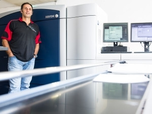 Topcopy owner and manager Dimitri Haralambous and the Xerox Colour 1000.