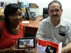 Varsity joy... A unique netsurfer tablet that comes embedded with 183 hours of curriculum-aligned maths and science content helped Alexandria matriculant Siviwe Mbele achieve a distinction in mathematics - and a place in university. She is pictured here with Prof Werner Olivier of Nelson Mandela Metropolitan University's Govan Mbeki Mathematics Development Unit, which created the content for the tablet, the brainchild of Future Mobile Technology, which is also available commercially as the netsurfer SCHOLAR.