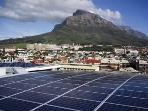 Roof-mounted solar panels at Black River Park produce power that feeds both the office park and the city's grid.