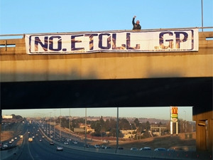 Anti-toll banners have been seen draped over bridges around Gauteng Freeway Improvement Project roads of late.