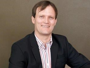 Ernest Kleynhans, MD of AIS.