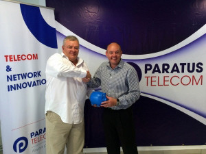 Paratus Group CEO Barney Harmse with Vox Telecom CEO: Jacques du Toit, holding the proverbial piggy bank to seal the deal.