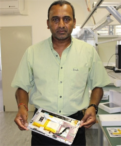 CZ Electronics CEO Sagran Pillay with one of the semi-assembled tablets that will go into production next month.