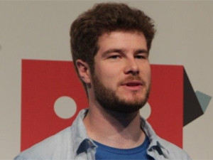 Pebble founder Eric Migicovsky punts the company's smartwatch at Mobile World Congress 2015.