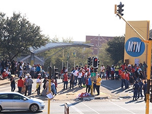 The Communication Workers Union allegedly bussed supporters to MTN for this morning's strike.