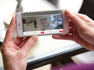 Small business owners can conveniently manage their network video system via mobile devices such as smartphones or tablets. Image source: http://www.axis.com/sites/default/files/remote-access-1170x658px.jpg
