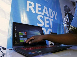 A Microsoft delegate explores Windows 10 at the launch event in Nairobi, Kenya.