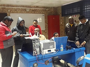 Matric learners at Southview High School do some work on the connected devices.