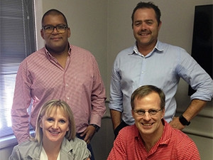 Shared business ethos: Kim Fletterman, Derek Hughes (sitting), Jason Timm, Rudolf Niehaus (standing)