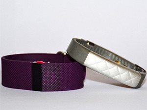 Compared with the Jawbone UP3, the Fitbit Charge HR (left) feels clumsy and clunky