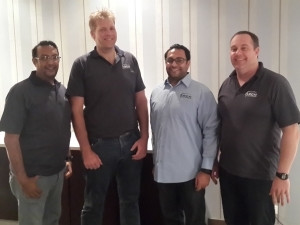 In the AES offices in Kinshasa, f.l.t.r. Directors Sajjid Patel, Alex van Hoeken and Imran Patel, accompanied by Reuben Kloot (Business Development Consultant, Africa - Arch Retail Systems)