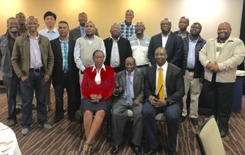 Lesotho Electricity Company CEO, Mots'oikha (seated centre) shares a photo moment with Emcom Sales & Business Director, Tony Sipho Sibanda (seated right) and key officials at a ceremony held in Maseru.
