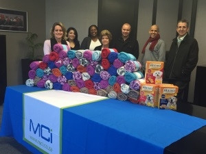 MCI Donates 67 Blankets for Mandela Day.