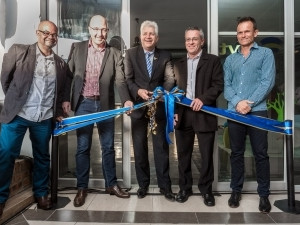 The ceremonial cutting of the ribbon. From left to right-Brian Ford, Jacques Fouche, Minister Alan Winde, Jaco van der Merwe and Chris Wilkins.