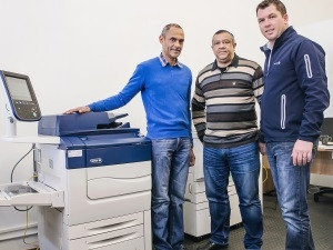 From left to right, Robin van Graan and Andre Rustin of Essential DigiHub and Bryn Whithair of Cape Office Machines