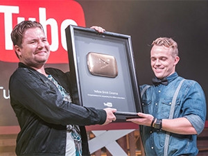 Yellow Brick Cinema founder and marketing manager Roche Klue and Shaun Williams received a YouTube Gold Play Button in recognition of reaching one million subscribers.