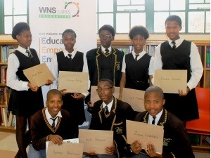 The students behind Project Heavenly Hygiene receive certificates for their deed of service from WNS.