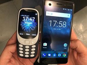 The reinvented Nokia 3310 next to the Nokia 6 device.