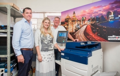 Bryn Whithair of Cape Office Machines with Cape Branding Services' business owner Sonja Cornelissen and CBS Manager Anthony Innes.