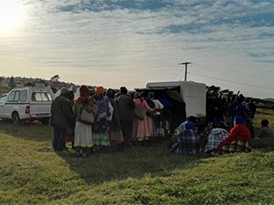 Social grants recipients line up at a CPS paypoint in Bizana in the Eastern Cape.