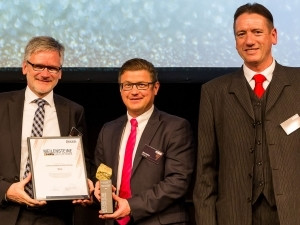 During the anniversary celebrations in Munich's Wappenhalle (coat-of-arms hall), chief editor Wiesb"ock (right) handed over the "Milestone of Electronics" to Rittal, represented by Martin Kandziora (centre), Head of Market Communication, and Ralf Schneider (left), Rittal's Head of Product Management and Business Development Climate Control.
