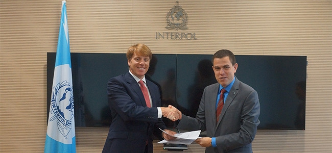 Mark Hughes, CEO of BT Security, and Silvino Schlickmann, director of the cyber crime directorate at Interpol.