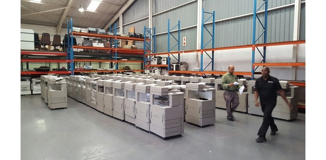 Refurbished Canon copiers at our warehouse.