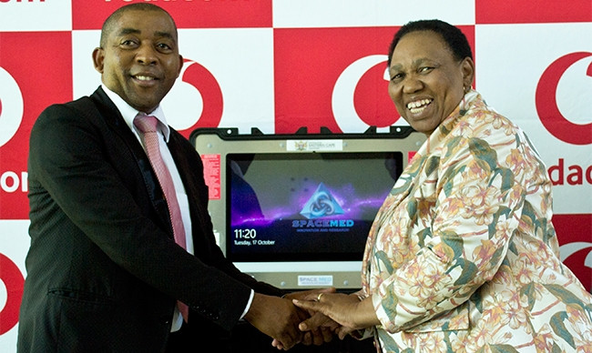 Basic education minister Angie Motshekga and Vodacom's Vuyani Jarana. (Photo by Brian Ngobese)