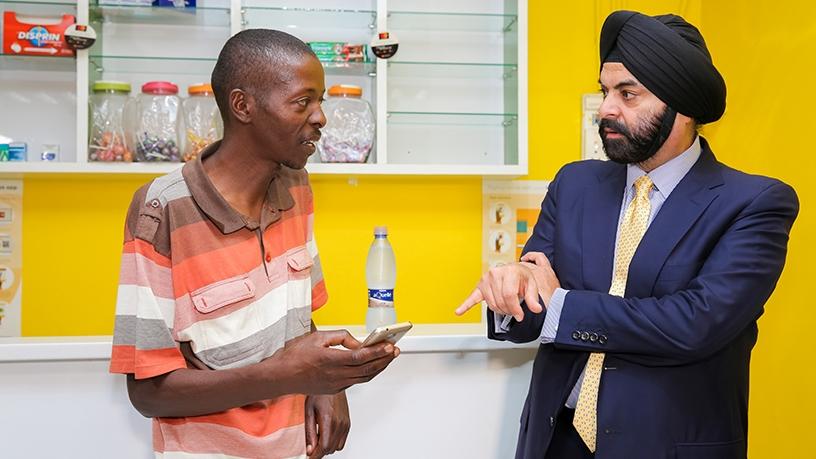Ajay Banga, Mastercard president and CEO discusses the-benefits of mobile payments with Paul Makuleke.