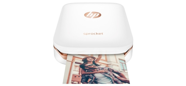 The ultra-portable, palm-sized HP Sprocket Photo Printer.