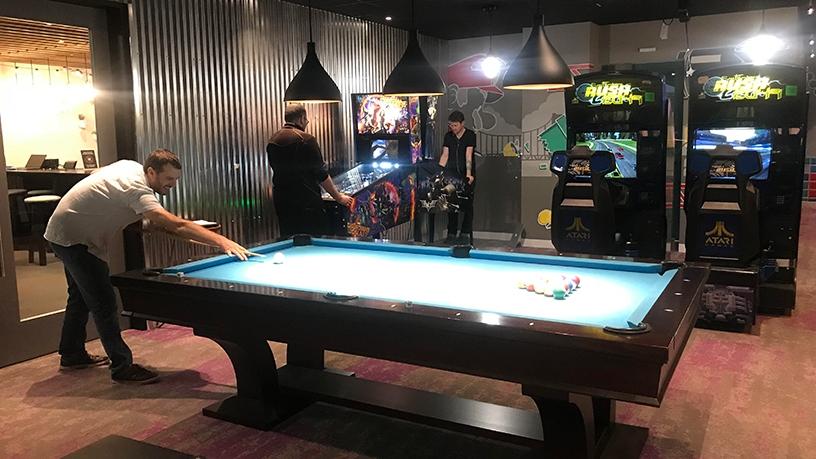 The Google games room has a foosball table, arcade games and a pool table.