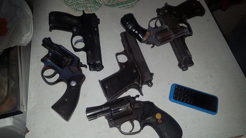 Some of the recovered illegal firearms.