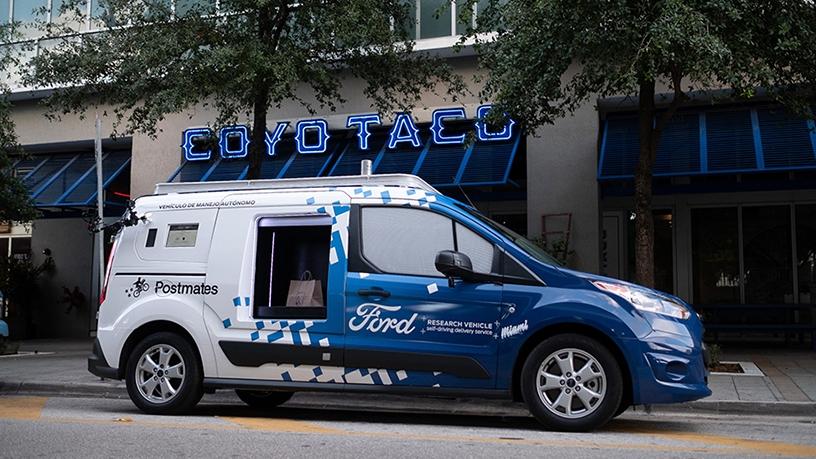 Ford's self-driving delivery vehicle features lockers for food and goods pick-up.